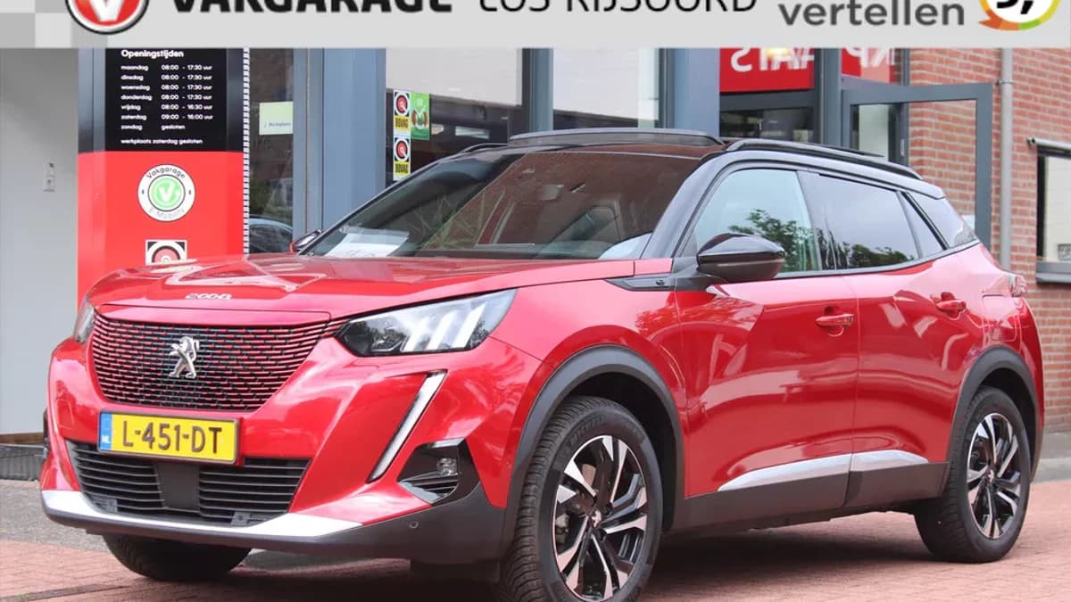 Peugeot E-2008 Ev 50kwh *Gt* | Soh 88.31% | 3-Fase | Schuifdak | Camera | Carplay | Navigatie | Stoelverwarming | Cruise & Climate Control | — foto 1