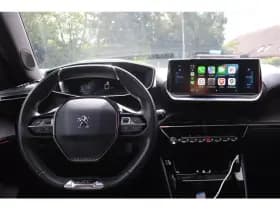 Peugeot E-2008 Ev 50kwh *Gt* | Soh 88.31% | 3-Fase | Schuifdak | Camera | Carplay | Navigatie | Stoelverwarming | Cruise & Climate Control | thumbnail 7