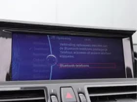 BMW Z4 Roadster sDrive18i | NL-auto | Leder | Navigatie | 18" | Stoelverwarming thumbnail 40