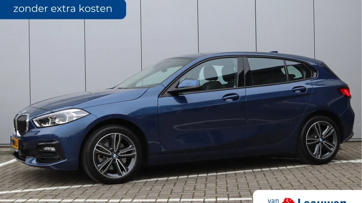 BMW 1-serie 118i Business Edition | Sportline | Navigatie | Sportstoelen | Org. NL — foto 1