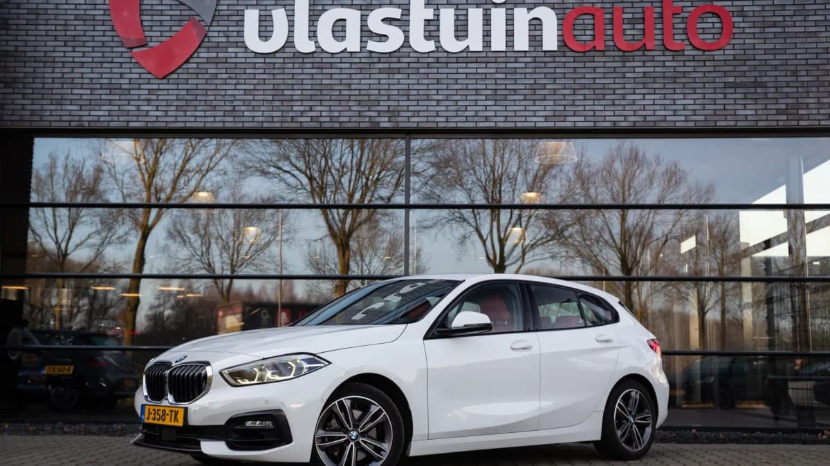 BMW 1-serie 118i Executive Edition , Achteruitrijcamera, Leer — foto 1
