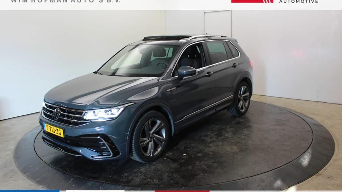 Volkswagen Tiguan 1.5 TSI R-Line EL Trekh+aKlep Panodak Virtual Camera Zwarte hemel bkl — foto 1