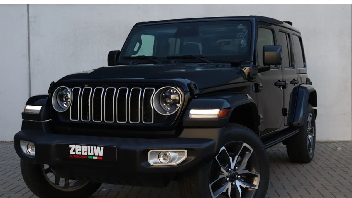 Jeep Wrangler Unlimited 4xe 380 PK Sahara | Schuifdak | Leder | Camera | Navi | 20" — foto 1