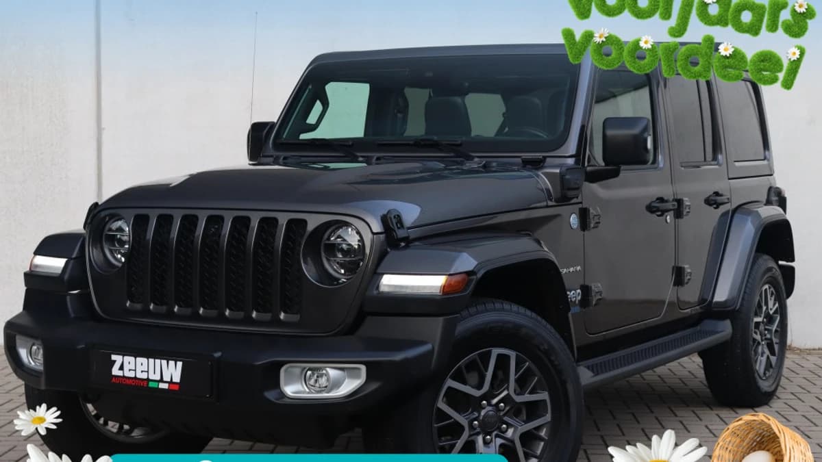 Jeep Wrangler Unlimited 4xe 380 PK Sahara | Leder | Soft Top | Camera | 18" — foto 1