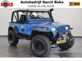 Jeep Wrangler 4.0i Softtop 4WD Luxe Leder Automaat